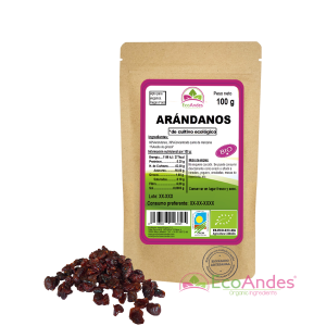 Bolsa de 100g con contenido de Arandanos rojos sin azucar de la marca EcoAndes. El envase es de papel kraft con ventana transparente que muestra el contenido, etiqueta frontal con información nutricional, certificaciones ecológicas, sin gluten y sello de "envasado artesanal".
