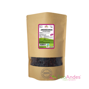 Bolsa de 1kg con contenido de Arandanos rojos sin azucar de la marca EcoAndes. El envase es de papel kraft con ventana transparente que muestra el contenido, etiqueta frontal con información nutricional, certificaciones ecológicas, sin gluten y sello de "envasado artesanal".