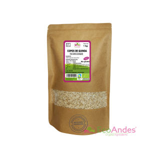 Bolsa de 1 kg de Copos de quinoa. de la marca EcoAndes. El envase es de papel kraft con ventana transparente que muestra el contenido, etiqueta frontal con información nutricional, certificaciones ecológicas, sin gluten y sello de "envasado artesanal".