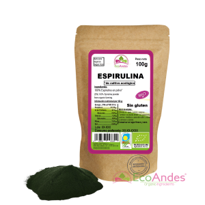 Bolsa de 100g de Espirulina en polvo de la marca EcoAndes. El envase es de papel kraft con ventana transparente que muestra el contenido, etiqueta frontal con información nutricional, certificaciones ecológicas, sin gluten y sello de "envasado artesanal".