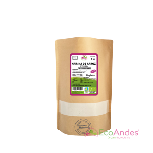 Bolsa de 1kg con contenido de Harina de arroz integral de la marca EcoAndes. El envase es de papel kraft con ventana transparente que muestra el contenido, etiqueta frontal con información nutricional, certificaciones ecológicas, sin gluten y sello de "envasado artesanal".