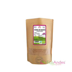 Bolsa de 1kg con contenido de Harina de banana de la marca EcoAndes. El envase es de papel kraft con ventana transparente que muestra el contenido, etiqueta frontal con información nutricional, certificaciones ecológicas, sin gluten y sello de "envasado artesanal".