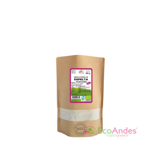 Bolsa de 500g con contenido de Harina de espelta de la marca EcoAndes. El envase es de papel kraft con ventana transparente que muestra el contenido, etiqueta frontal con información nutricional, certificaciones ecológicas, sin gluten y sello de "envasado artesanal".