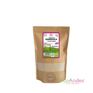 Bolsa de 1kg con contenido de Harina de mandioca de la marca EcoAndes. El envase es de papel kraft con ventana transparente que muestra el contenido, etiqueta frontal con información nutricional, certificaciones ecológicas, sin gluten y sello de "envasado artesanal".