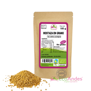Bolsa de 100g de Mostaza en grano de la marca EcoAndes. El envase es de papel kraft con ventana transparente que muestra el contenido, etiqueta frontal con información nutricional, certificaciones ecológicas, sin gluten y sello de "envasado artesanal".