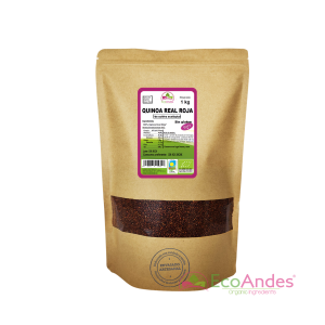 Bolsa de 1 kg de quinoa real roja orgánica de la marca EcoAndes. El envase es de papel kraft con ventana transparente que muestra el contenido, etiqueta frontal con información nutricional, certificaciones ecológicas, sin gluten y sello de "envasado artesanal".