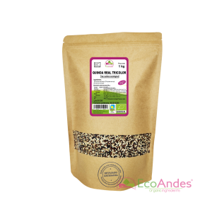 Bolsa de 1 kg de quinoa tricolor (mezcla de quinoa blanca, roja y negra) orgánico de la marca EcoAndes. El envase es de papel kraft con ventana transparente que muestra el contenido, etiqueta frontal con información nutricional, certificaciones ecológicas, sin gluten y sello de "envasado artesanal".