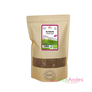 Bolsa de 1kg con contenido de semillas de alfalfa de la marca EcoAndes. El envase es de papel kraft con ventana transparente que muestra el contenido, etiqueta frontal con información nutricional, certificaciones ecológicas, sin gluten y sello de "envasado artesanal".