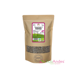 Bolsa de 1kg con contenido de semillas de girasol de la marca EcoAndes. El envase es de papel kraft con ventana transparente que muestra el contenido, etiqueta frontal con información nutricional, certificaciones ecológicas, sin gluten y sello de "envasado artesanal".
