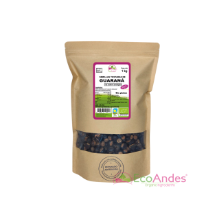 Bolsa de 1kg con contenido de semillas de guaraná de la marca EcoAndes. El envase es de papel kraft con ventana transparente que muestra el contenido, etiqueta frontal con información nutricional, certificaciones ecológicas, sin gluten y sello de "envasado artesanal".