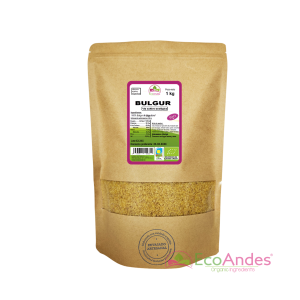 Bolsa de 1 kg de bulgur orgánico de la marca EcoAndes. El envase es de papel kraft con ventana transparente que muestra el contenido, etiqueta frontal con información nutricional, certificaciones ecológicas, y sello de "envasado artesanal".
