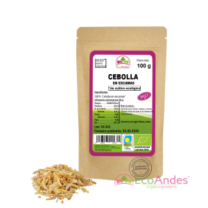 Bolsa de 100g de cebolla en escamas de la marca EcoAndes. El envase es de papel kraft con ventana transparente que muestra el contenido, etiqueta frontal con información nutricional, certificaciones ecológicas, sin gluten y sello de "envasado artesanal".